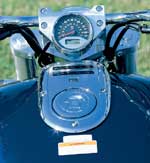 We love the billet risers with the integrated speedo/LED odometer. The plastic indicator housing on the tank doesn't suit the bike's stature .
